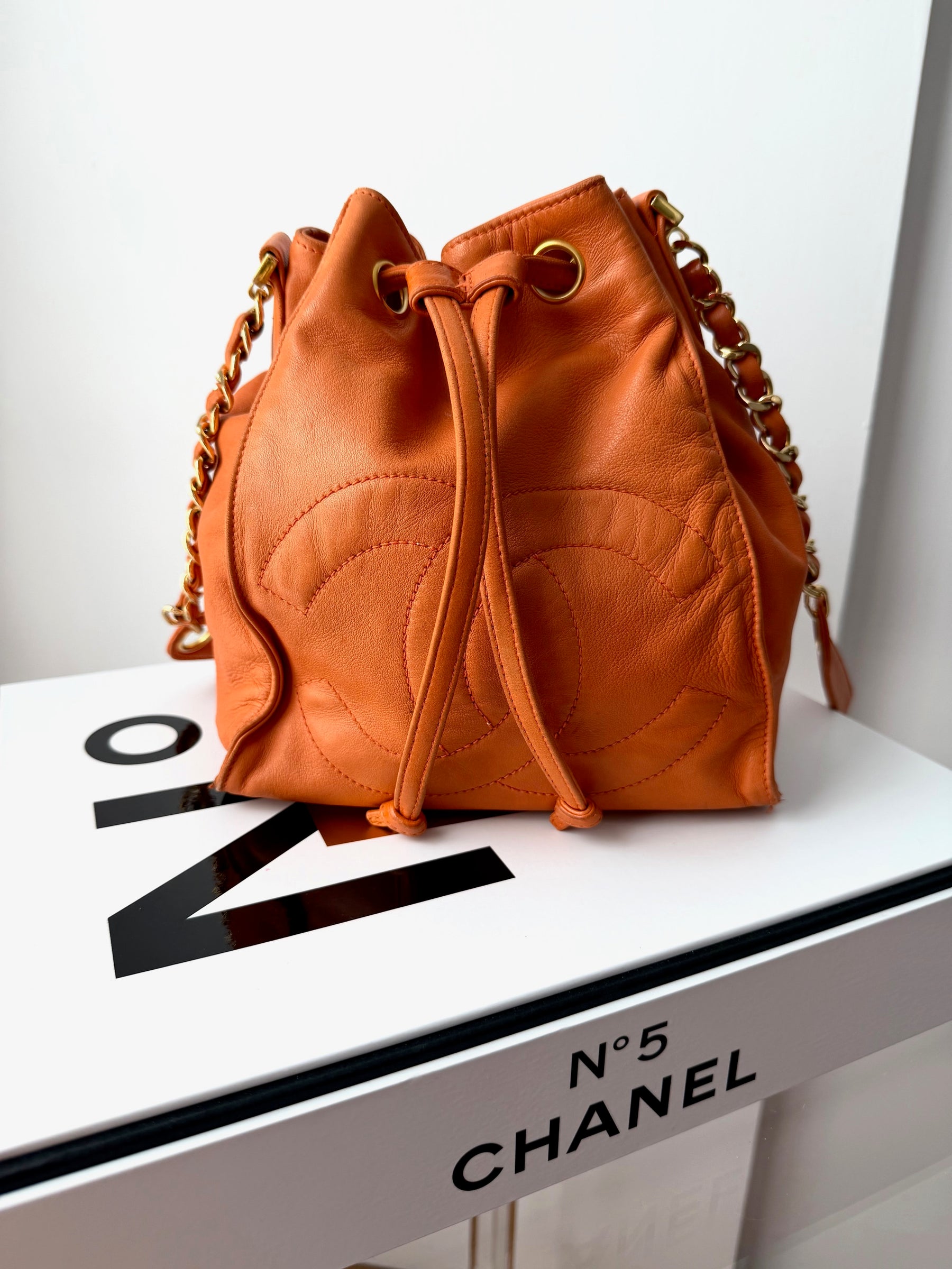 Vintage CHANEL Timeless Orange Lambskin Bucket Bag – DAGMAR ROSE Vintage CHANEL Timeless Orange Lambskin Bucket Bag – DAGMAR ROSE